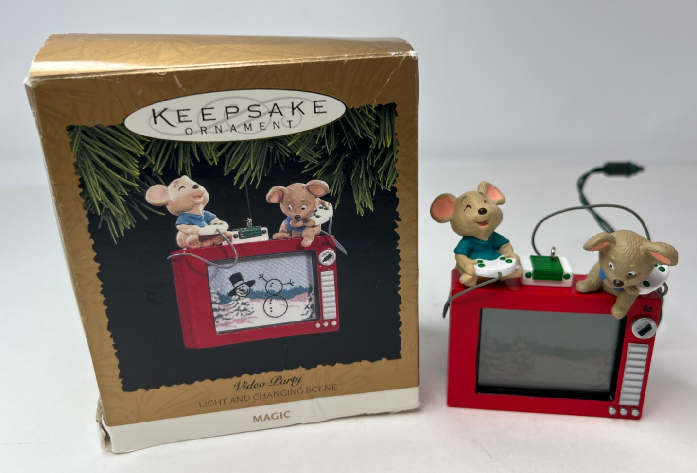 Hallmark Keepsake 1996 Magic Ornament Video Party Light Changing Scene Hallmark Keepsake 1996 Magic Ornament Video Party Light Changing Scene