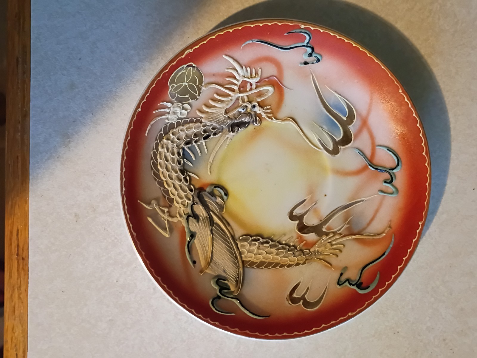 vintage piece of Japanese Dragonware, explicitly produced by the brand...