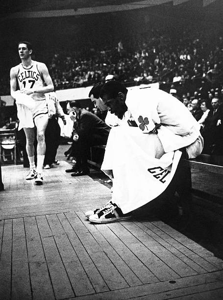 Bill Russell of Boston Celtics sits bench an NBA game 1960 Boston - Old Photo