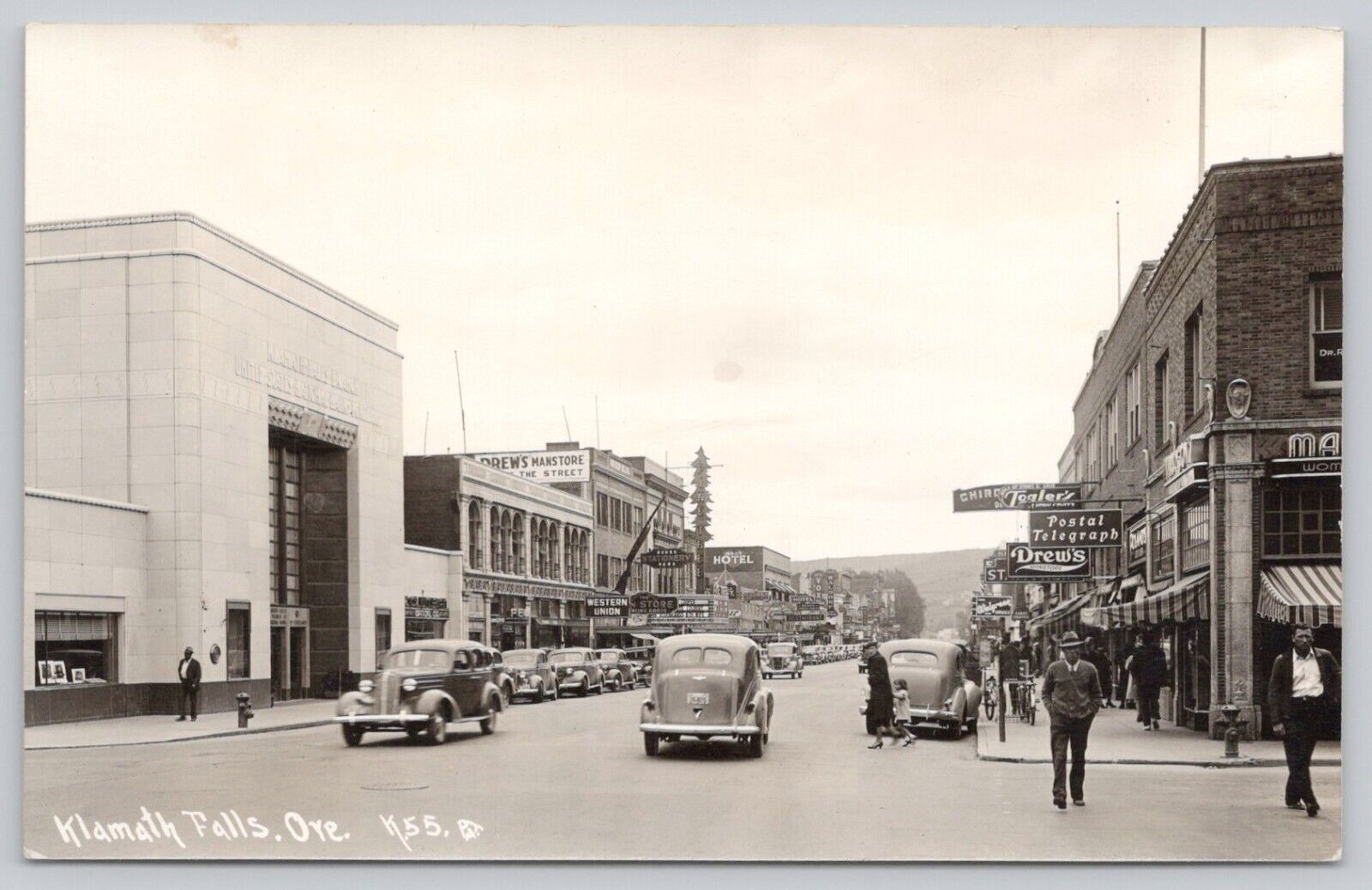 RPPC Postcard Klamath Falls Oregon Main Street Drews Manstore Vintage Cars