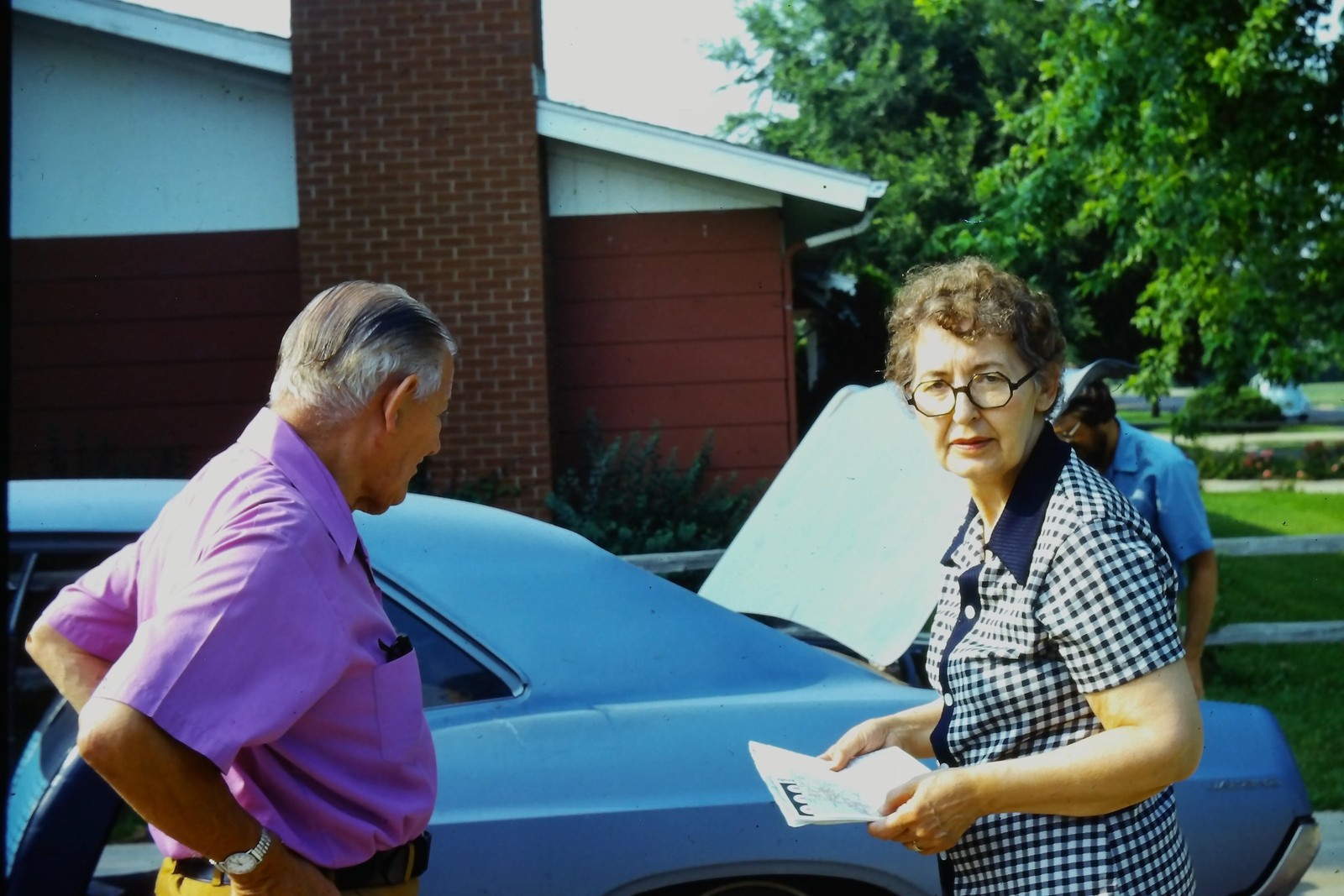c1970's Kodachrome 35mm Slide, Elderly Couple with Blue GM A Body Coupe Car