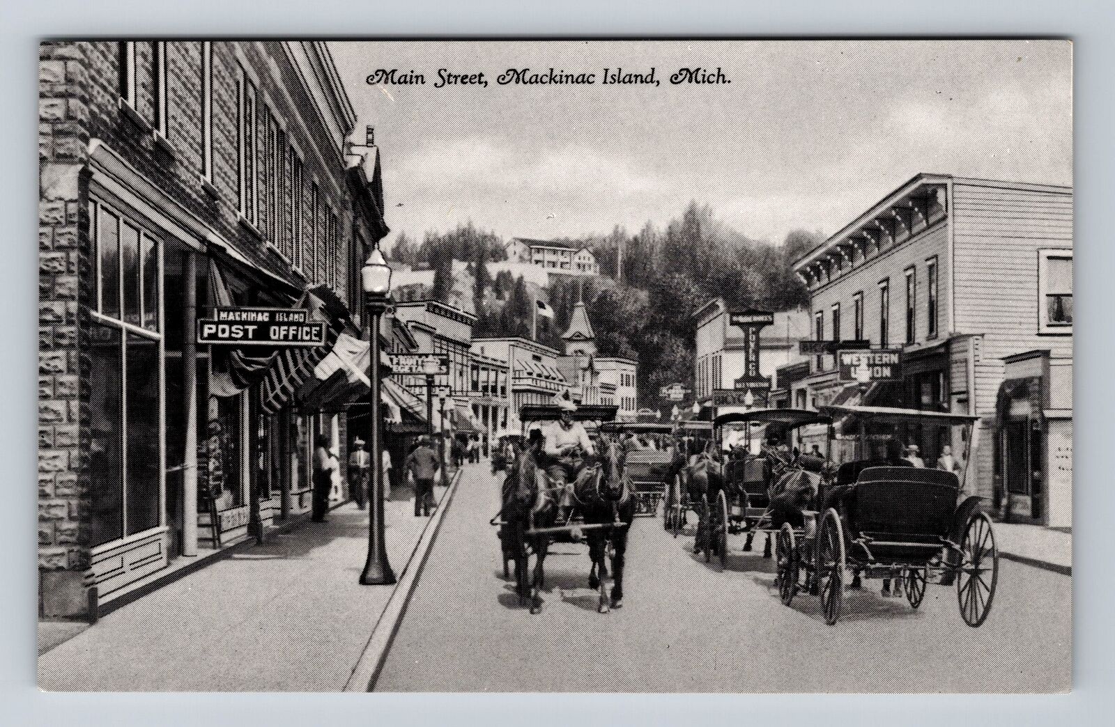 Mackinac Island MI-Michigan, Storefronts On Main Street Vintage Postcard