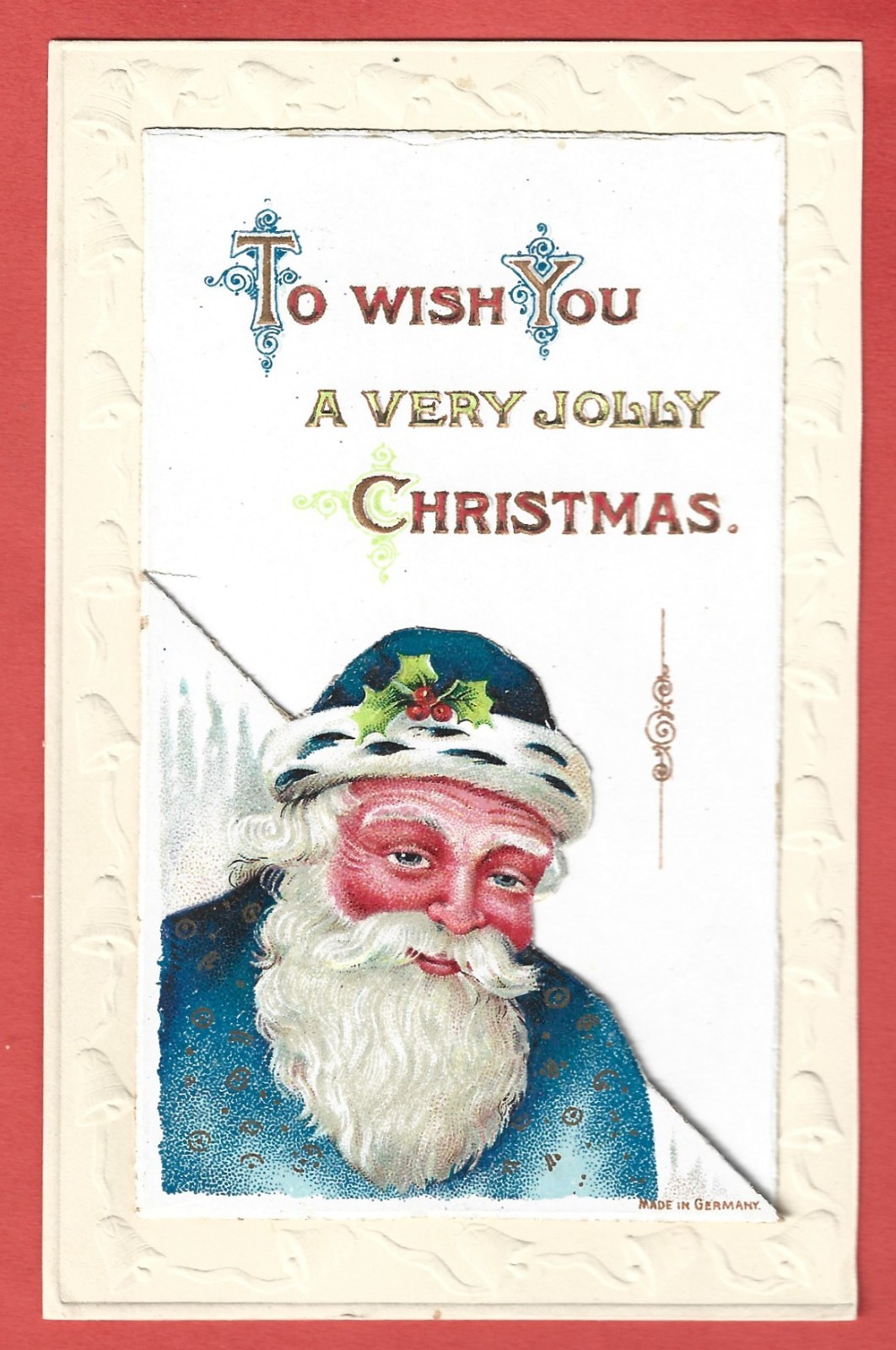 MERRY CHRISTMAS CARD with foldout embossed SANTA– Printed in Germany - c. 1915