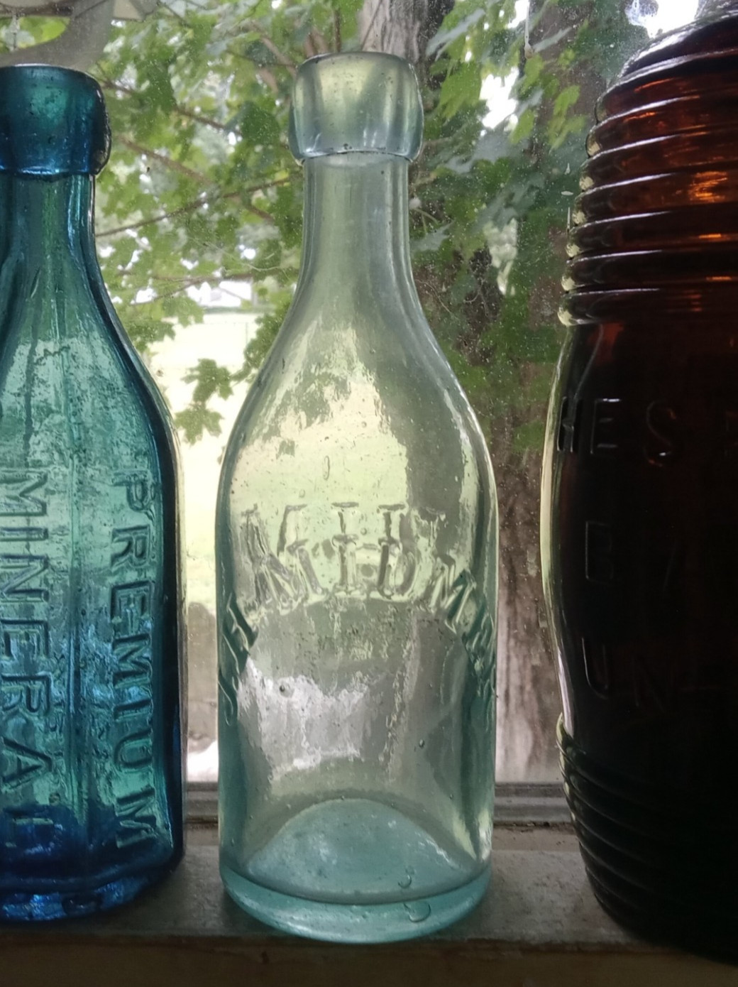 J.H.MIDMER 1860s APPLIED BLOB TOP LONG NECK SQUAT SODA BOTTLE JERSEY CITY,NJ?