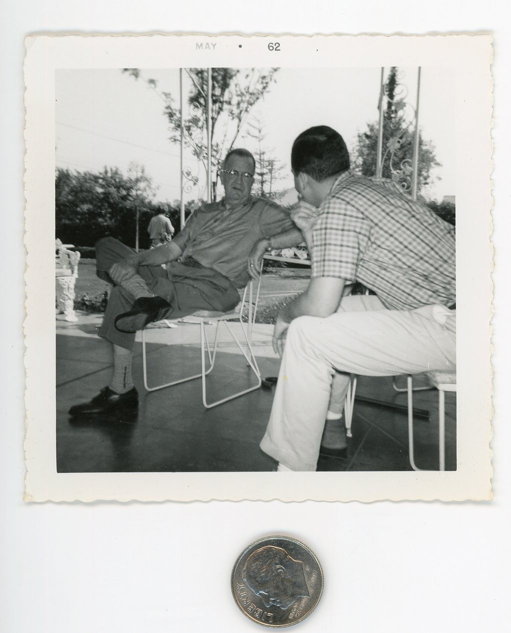 Old 1960's photo / Retired Salesman Regales Dork with Tales of Retail Sockwear