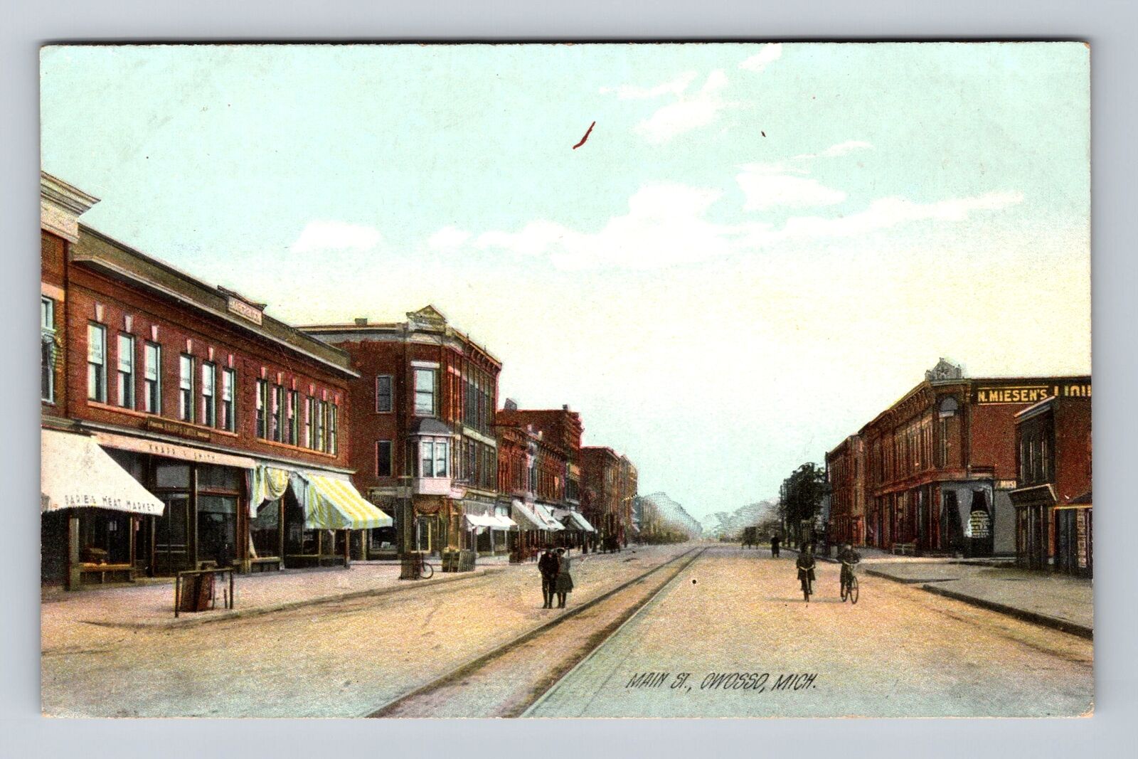 Owosso MI-Michigan Main St, Storefronts, Antique, Souvenir Vintage Postcard