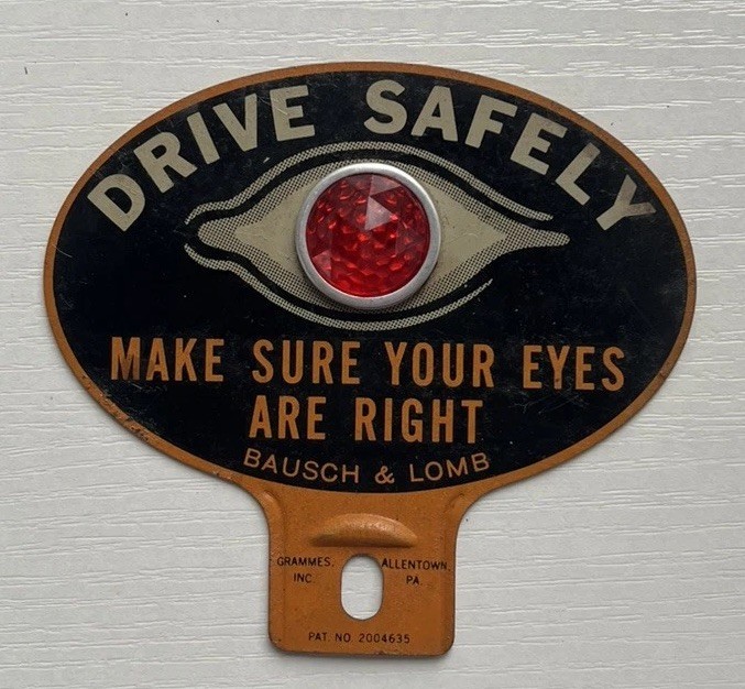 Vintage 1930s Bausch Lomb Drive Safely License Plate Topper Red Glass Reflector