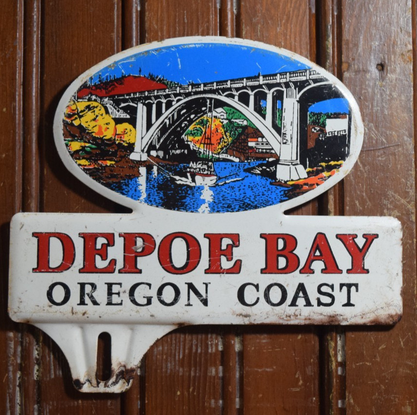 DEPOE BAY OREGON COAST STAMPED PAINTED METAL TOPPER SIGN AUTO BRIDGE CIRCA 1950s