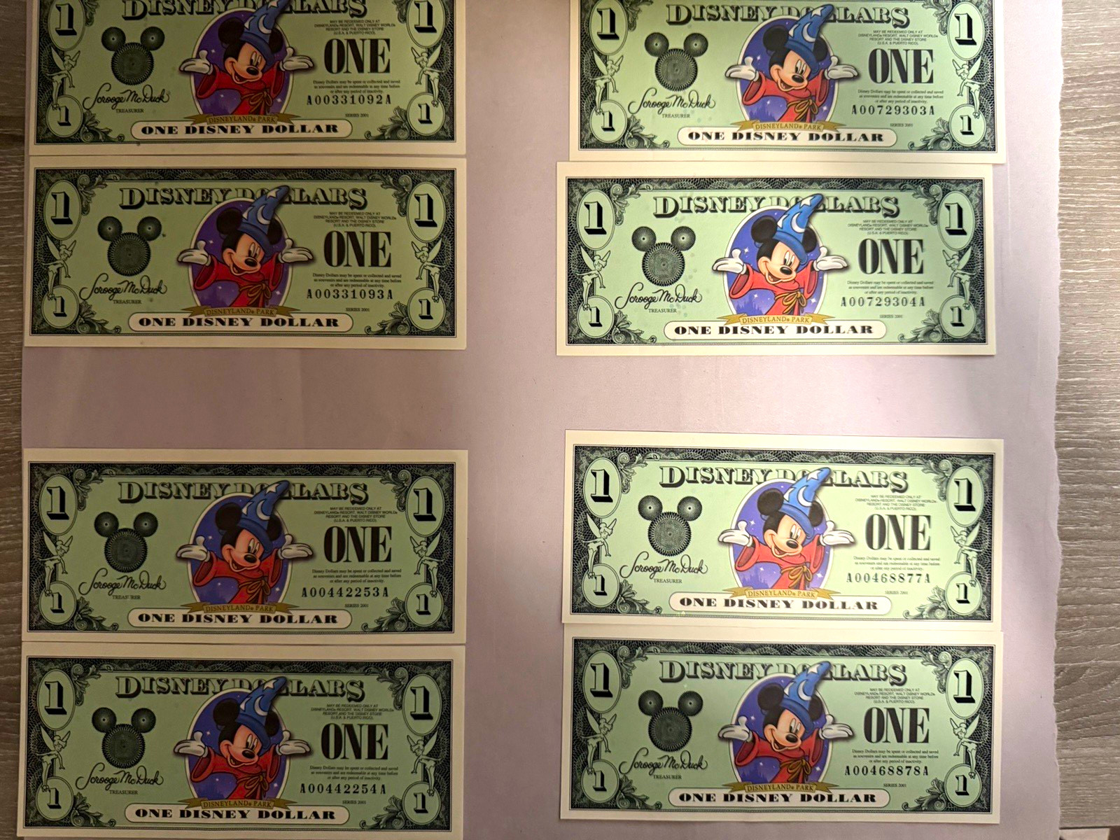Uncirculated Pristine Lot of 8 $1 Disney Dollars 2001 Series Mickey Mouse