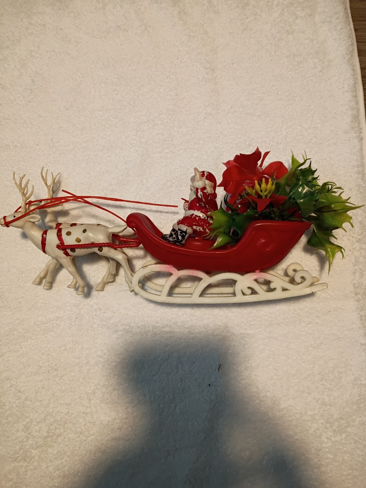 Vintage Plastic Waving Santa and White Reindeer With Missile toe In Slay