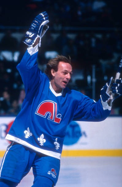 Guy Lafleur Quebec Nordiques skates on the ice as he celebrates a - Old Photo