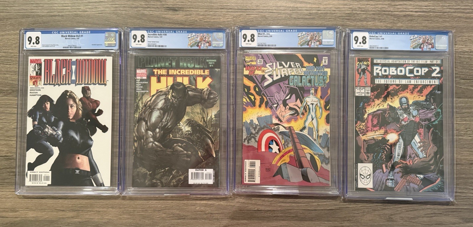 Marvel CGC 9.8 Comic Slab Lot of 4 Black Widow, Hulk, Silver Surfer, & Robocop