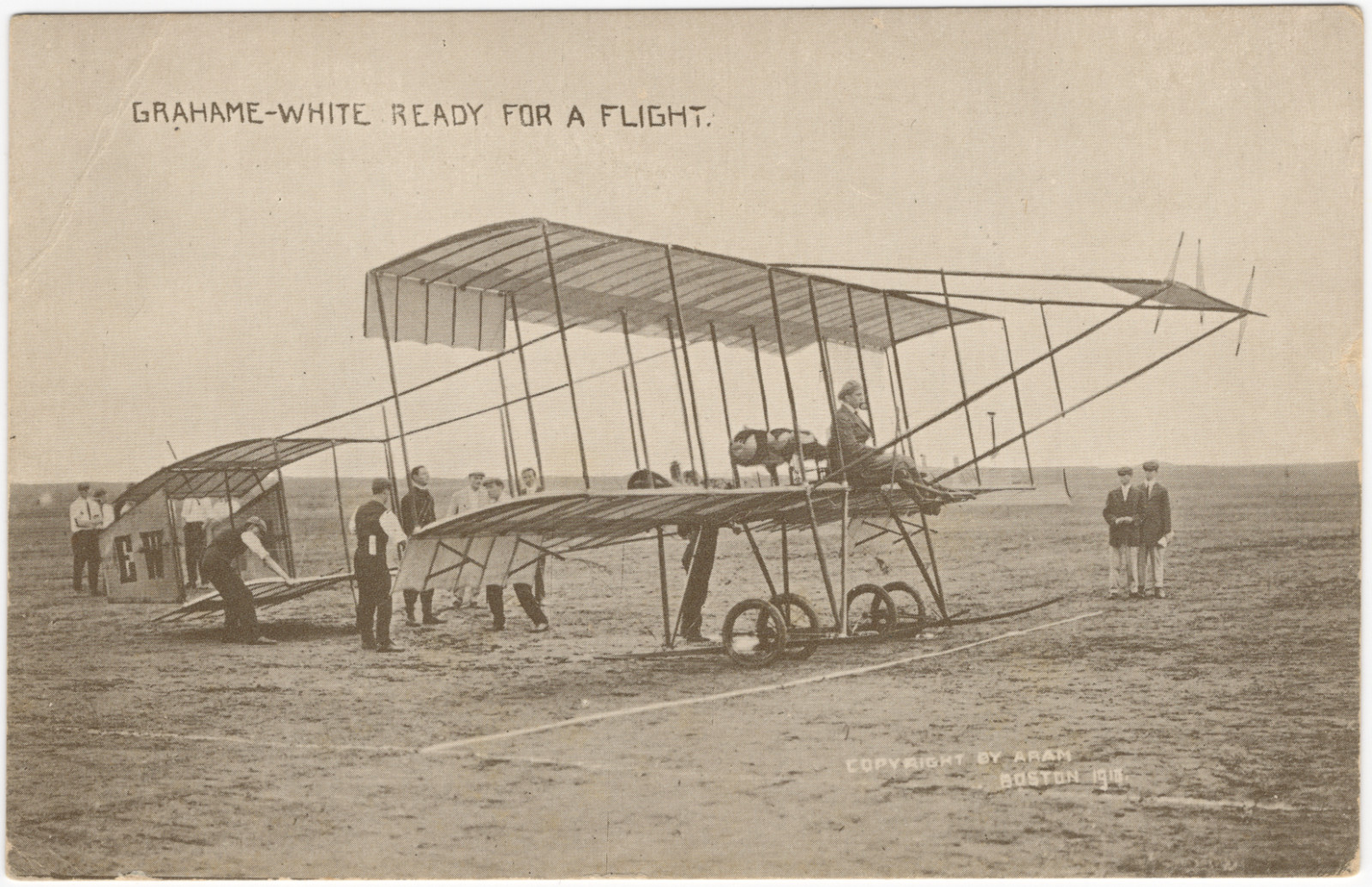 Grahame-White Mounts His Biplane, 1911 Harvard-Boston Aero Meet RPPC