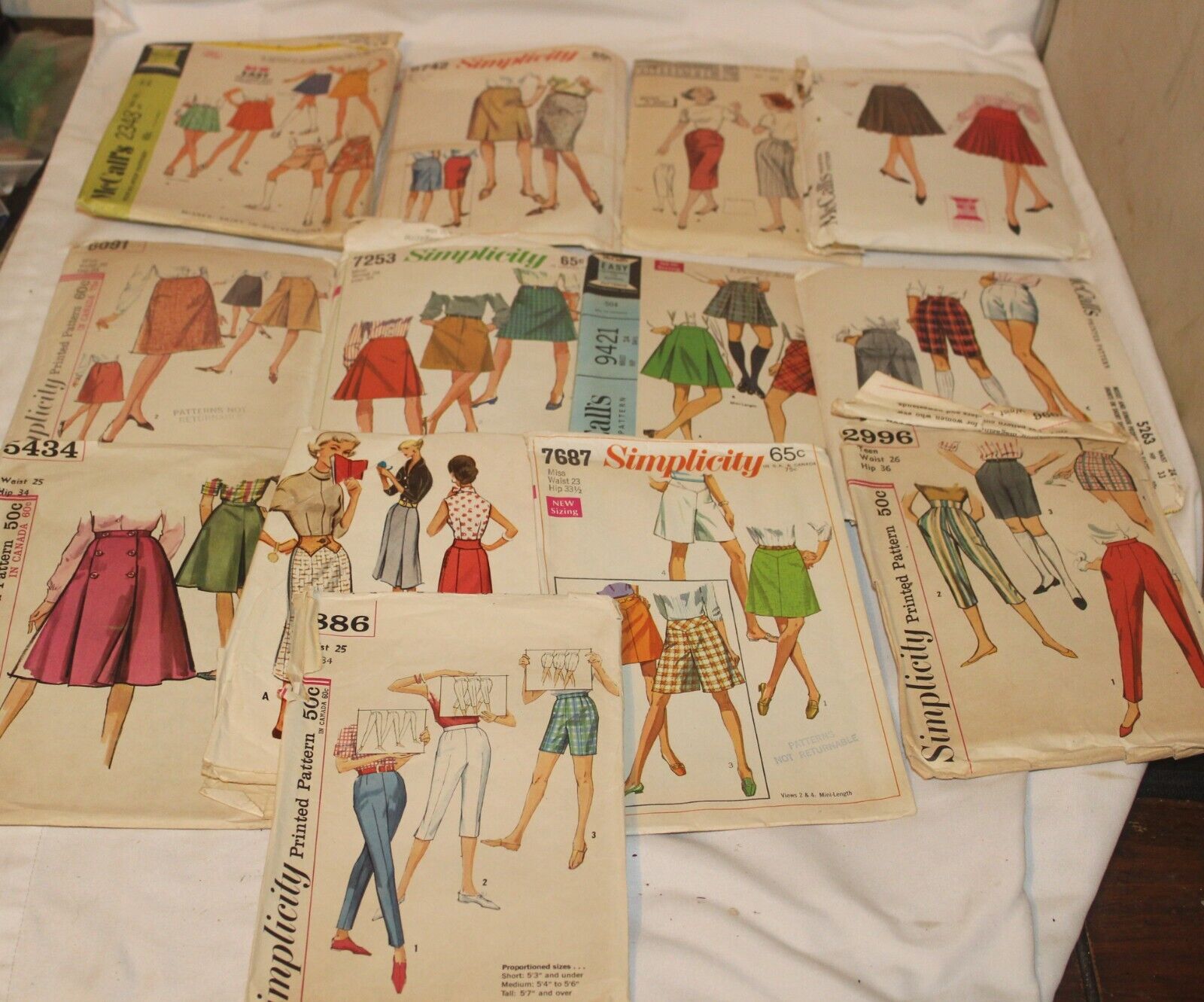 12 Vtg 1960's/70s Sewing Pattern Lot Women's Clothing Waist 24 Pants Skirt Capri
