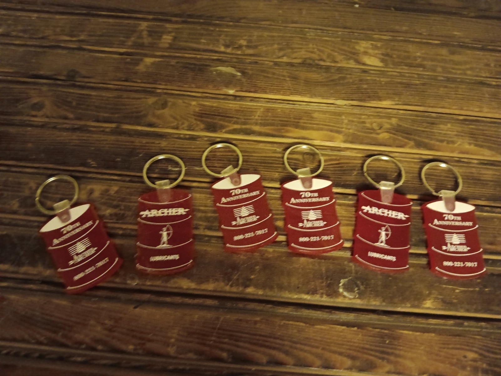 VTG Archer Lubricants barrel shaped key chain for 70th Anniversary