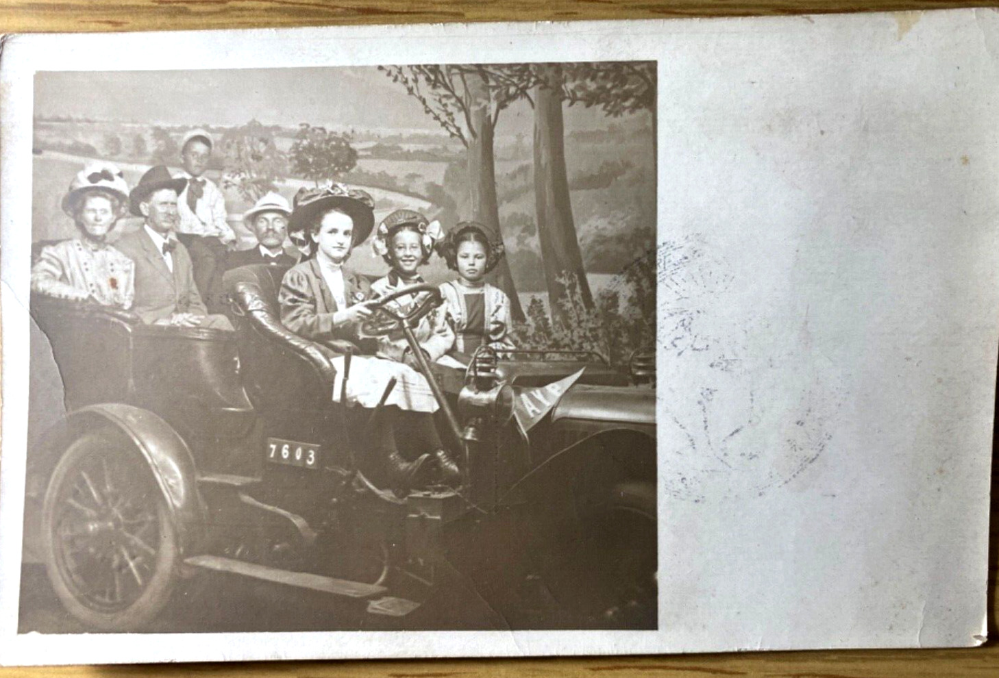 1909 RPPC: ALASKA-YUKON-PACIFIC EXPO, SEATTLE real photo postcard FAMILY IN CAR