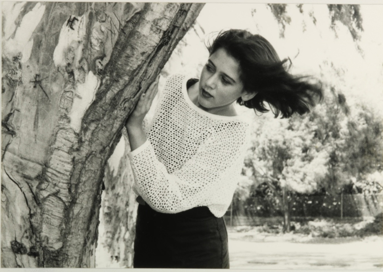 FOUND PHOTO - Pretty Girl posing with tree 1990s era FOUND PHOTO - Pretty Girl posing with tree 1990s era