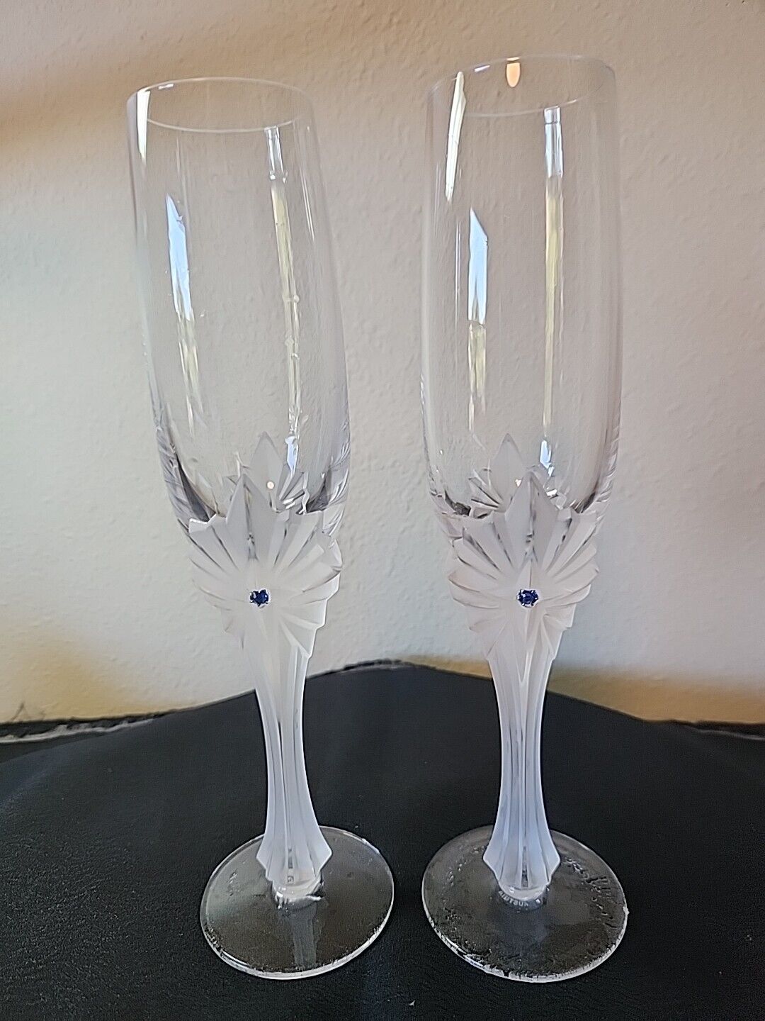 A Pair Of Austrian Stolzle Kristall Champagne Flutes