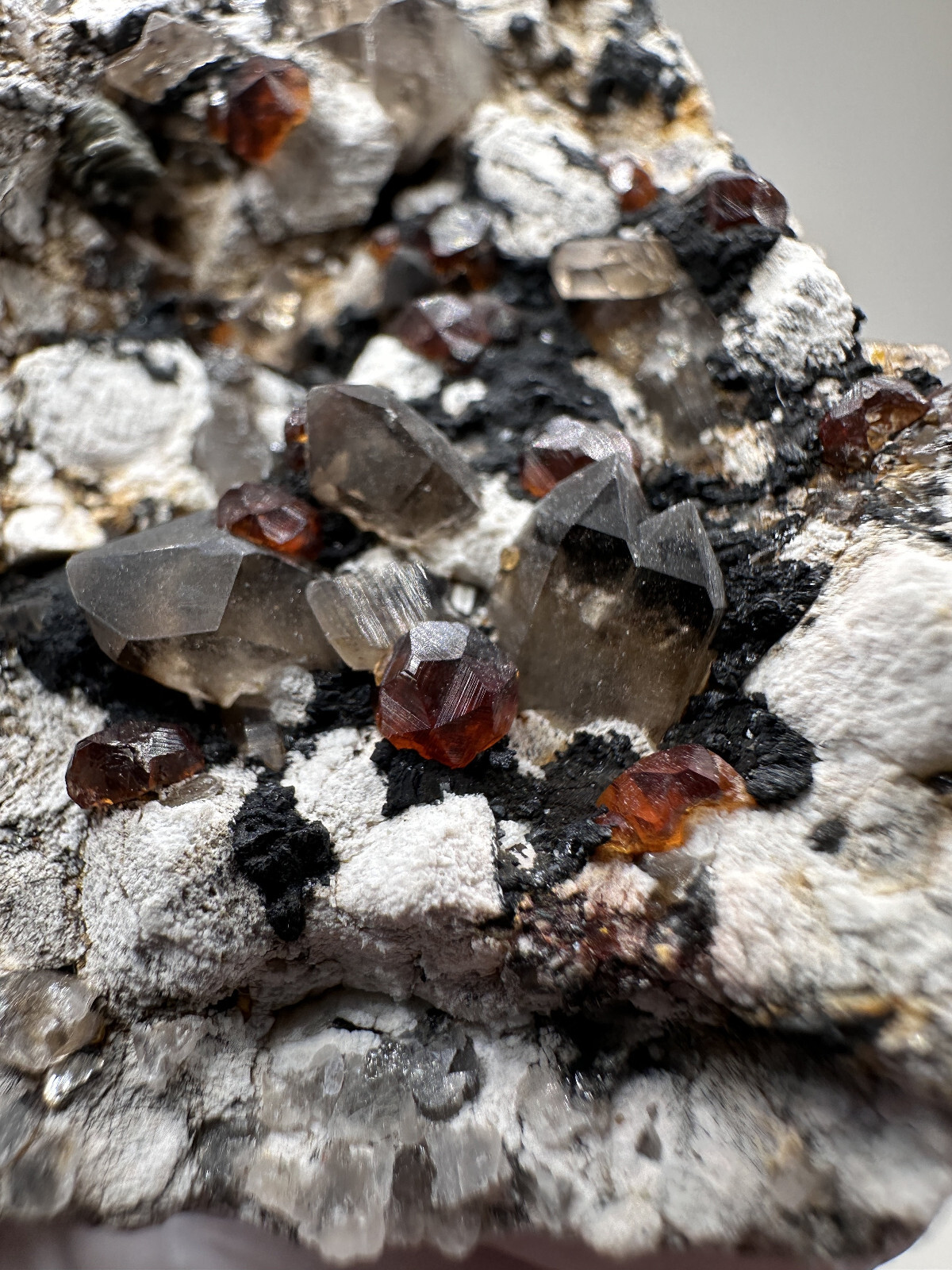 Gemmy Orange Spessartine on Smoky Quartz Fujian Province, China
