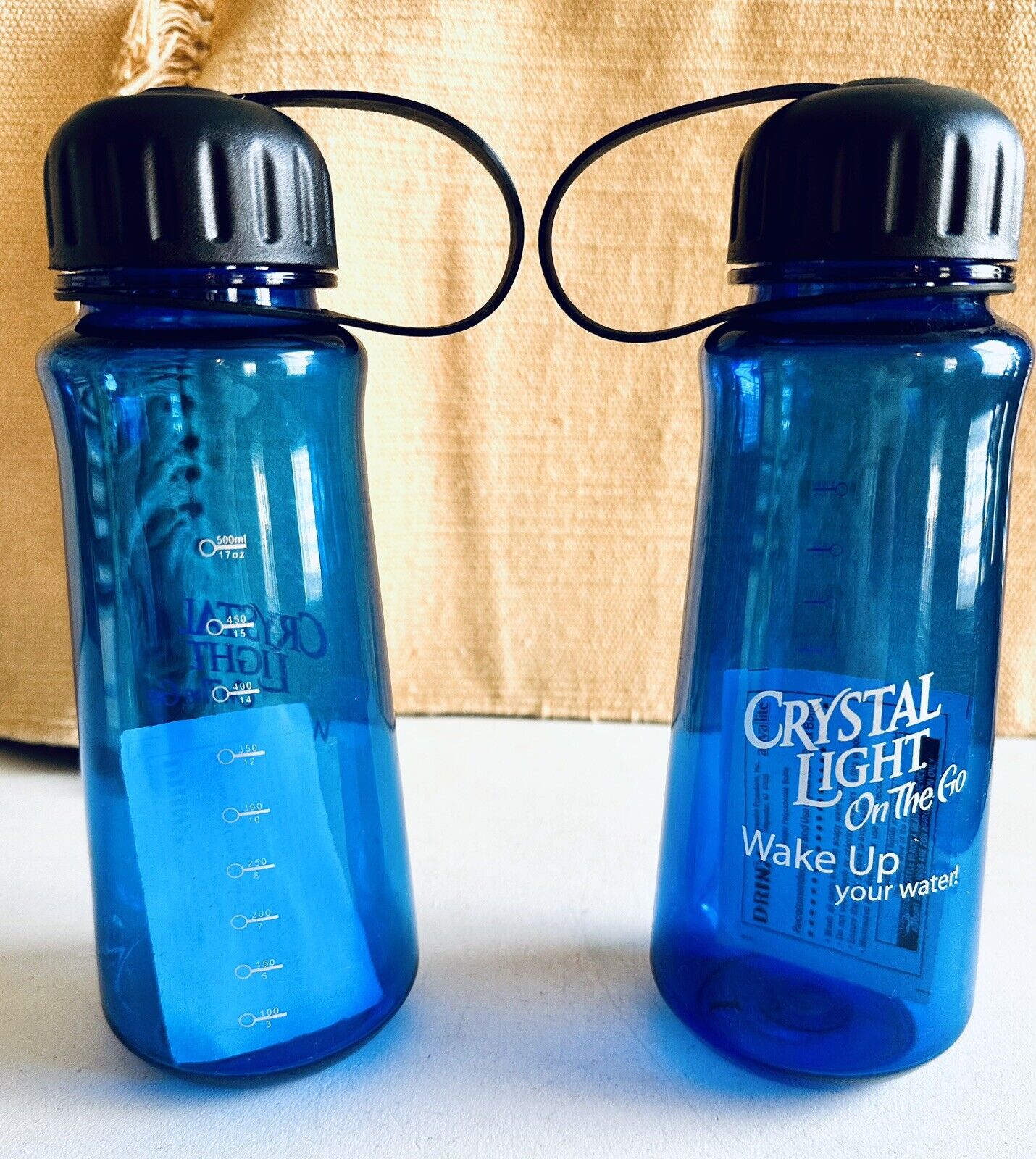 CRYSTAL LIGHT On The Go “Wake Up Your Water” Advertising Merch Water Bottles