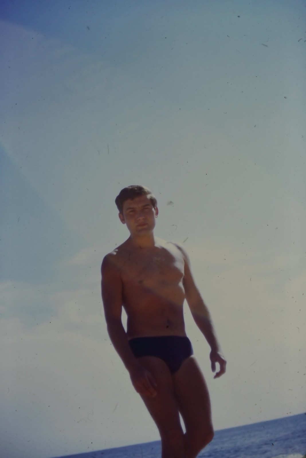 c1960\'s Kodachrome 35mm Slide Young Man Swim Trunks Beach Ocean Portrait Water