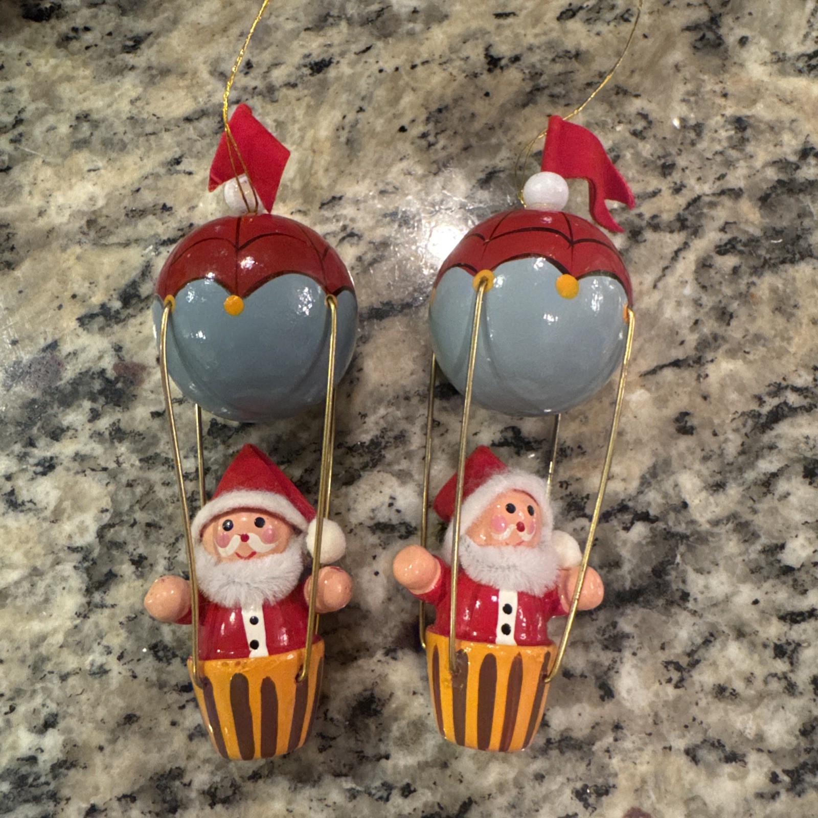 2 Vtg Hand Painted Wooden Santa In Hot Air Balloon Wood Xmas Ornaments 5”