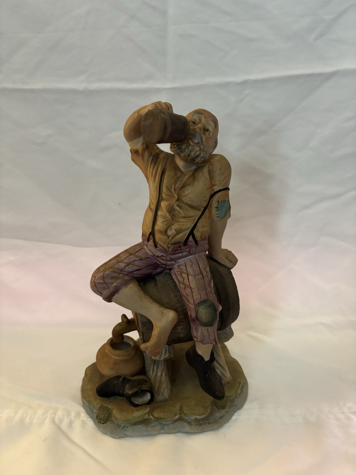 Statue Of Drunk Man On  Barrel Box H Glass