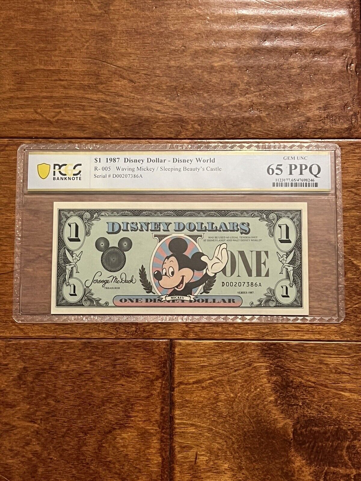 1987 $1 Vintage Disney Dollar Waving Mickey Mouse Graded by PCGS 65 PPQ Gem Unc