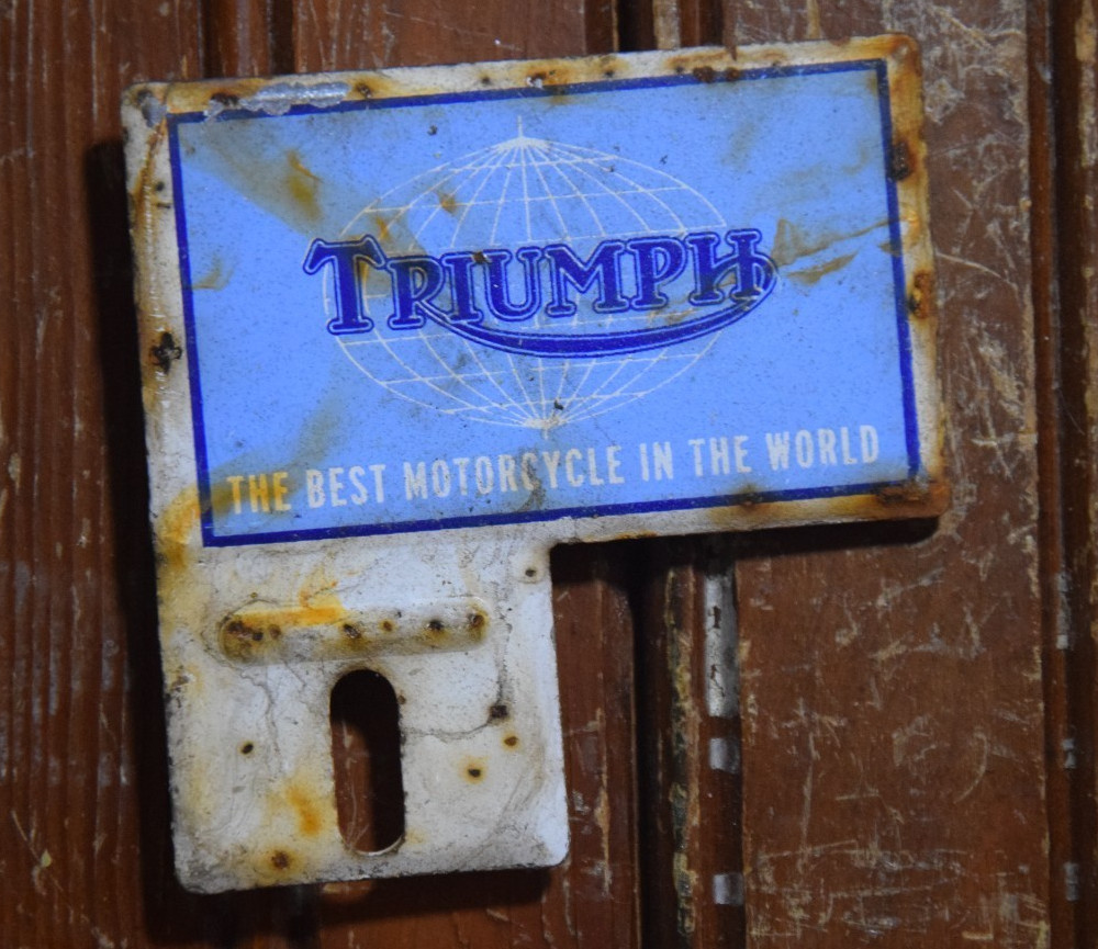TRIUMPH MOTORCYCLE BEST IN WORLD STAMPED PAINTED METAL BICYCLE TOPPER SIGN 1950s