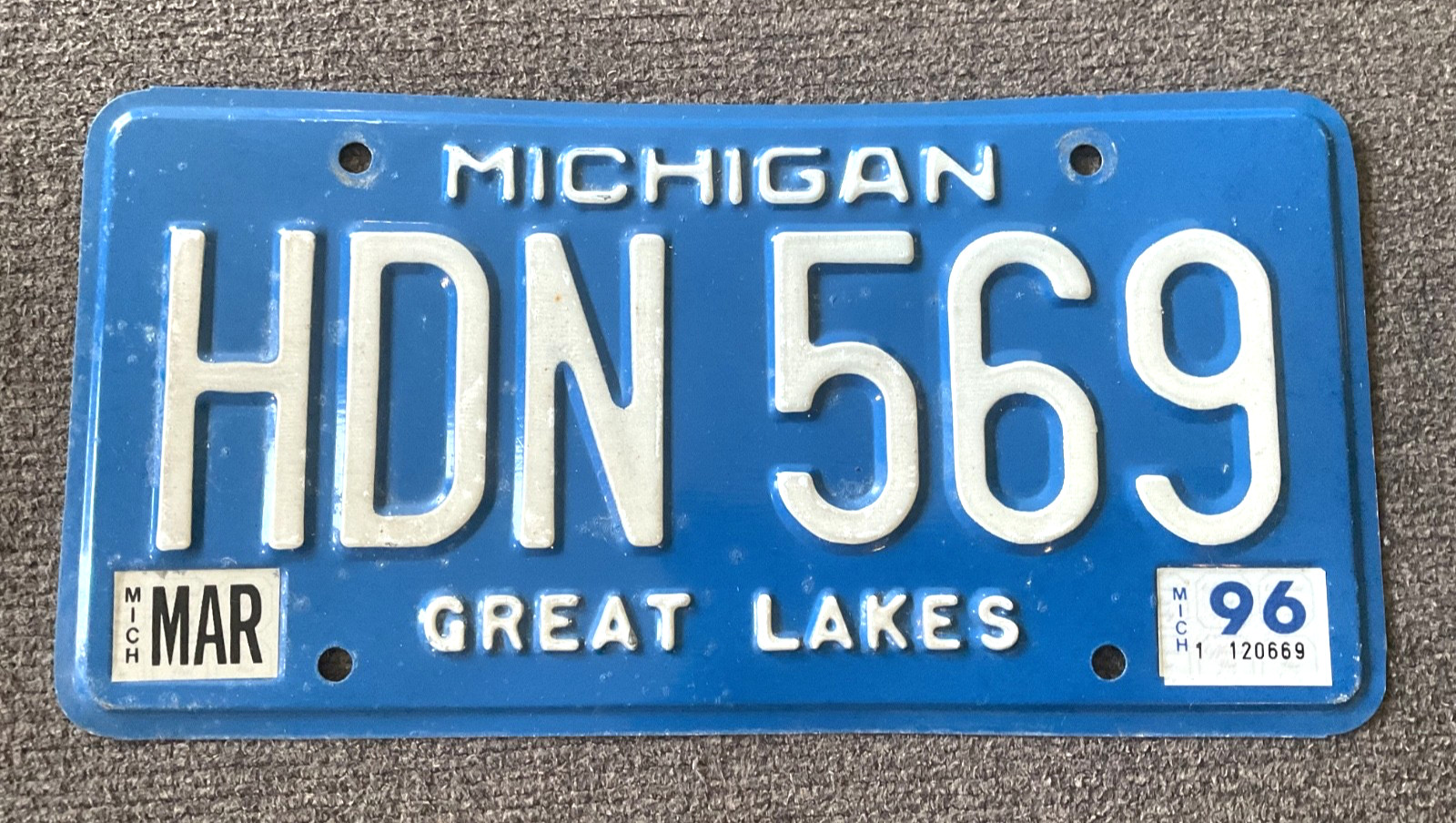 RARE 1996 MICHIGAN LICENSE PLATE BLUE BASE ORIGINAL CHEVY FORD DODGE NISSAN ETC RARE 1996 MICHIGAN LICENSE PLATE BLUE BASE ORIGINAL CHEVY FORD DODGE NISSAN ETC
