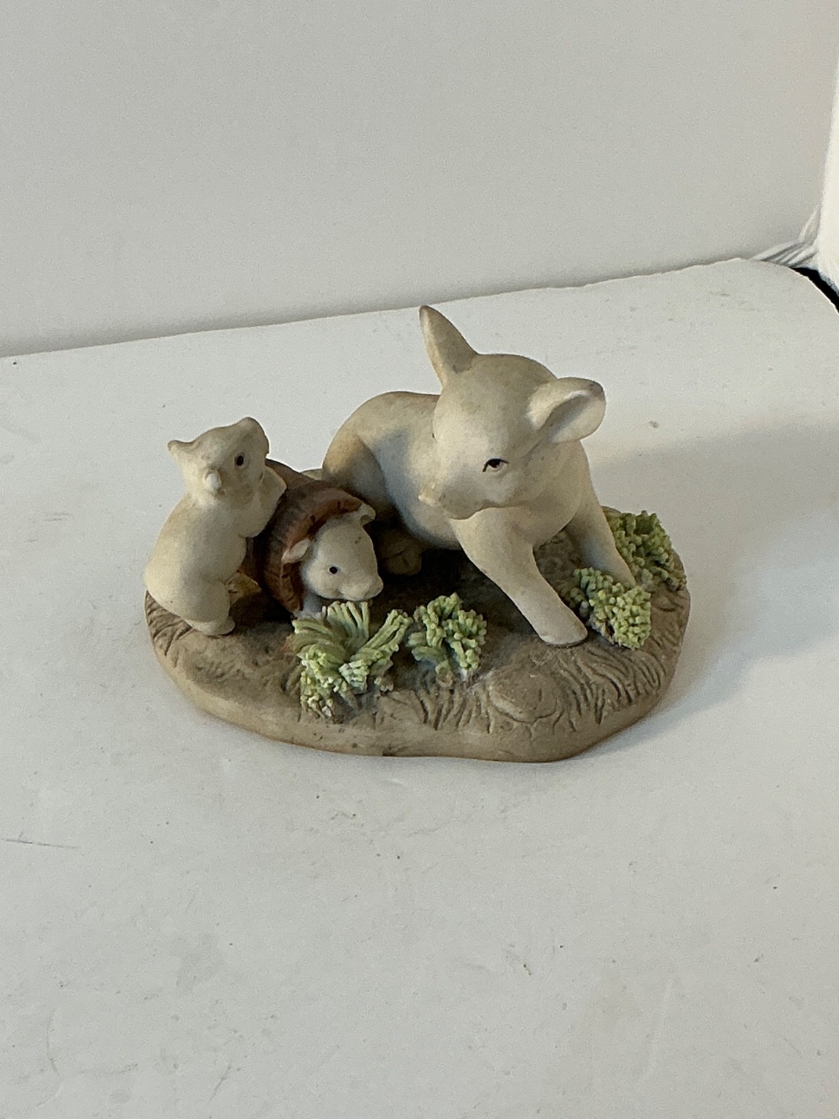 ENESCO 1987 porcelain pig figurine depicting a mother sow with piglets