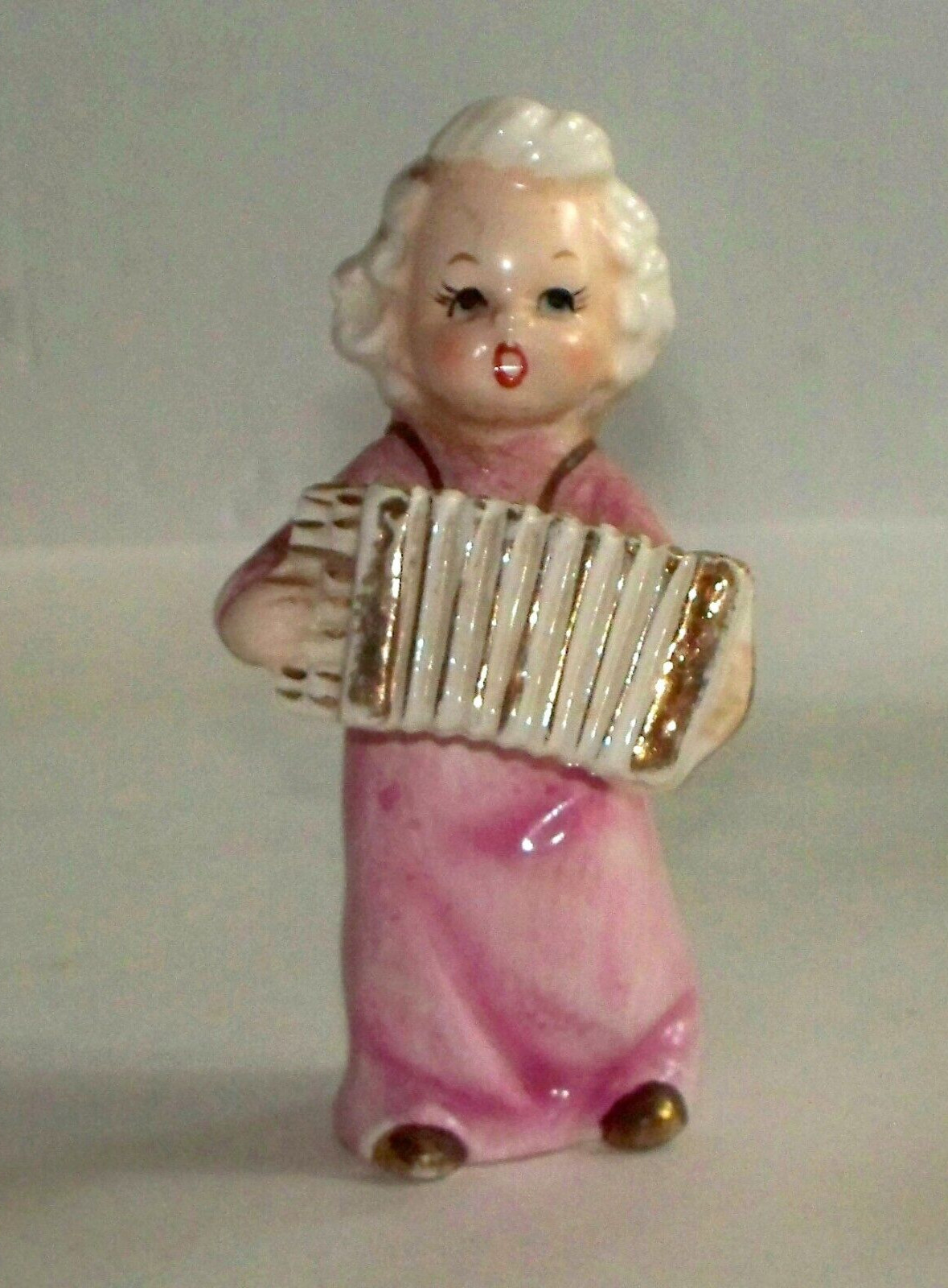 VINTAGE PORCELAIN FIGURINE Girl Playing the Accordion 4 1/2” High – D7