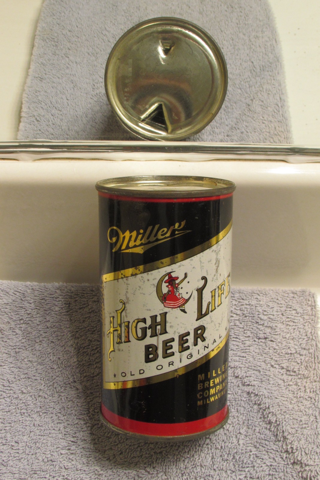 indoor 1950s MILLER HIGH LIFE, flat top beer can, Milwaukee, Wisconsin