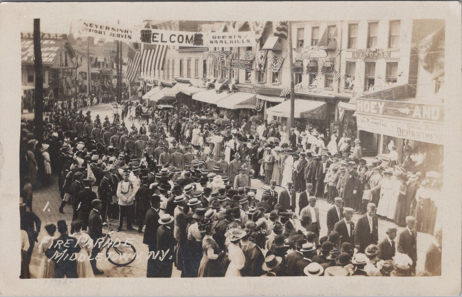 Fire Parade Firemen Marching Crowd Stores Middletown New York 1909 RPPC Postcard