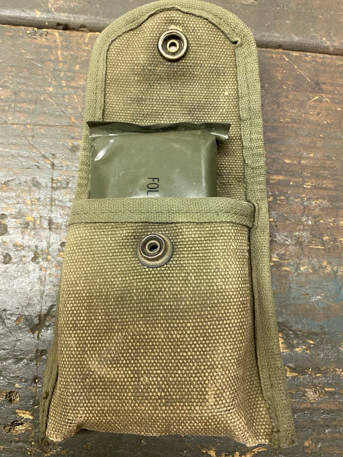 Vietnam 1972 1st Aid Dressing and Pouch.