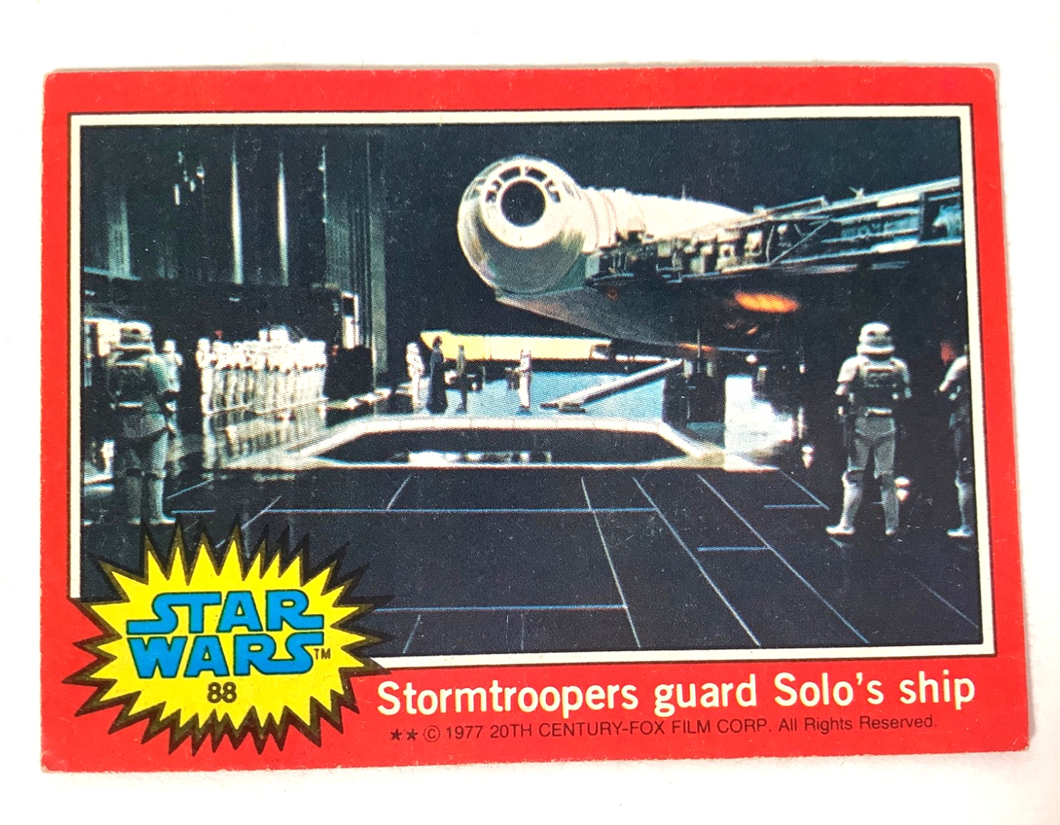 1977 Topps Star Wars Series 2 red Card #88 Stormtroopers guard Solo’s ship. 1977 Topps Star Wars Series 2 red Card #88 Stormtroopers guard Solo’s ship.