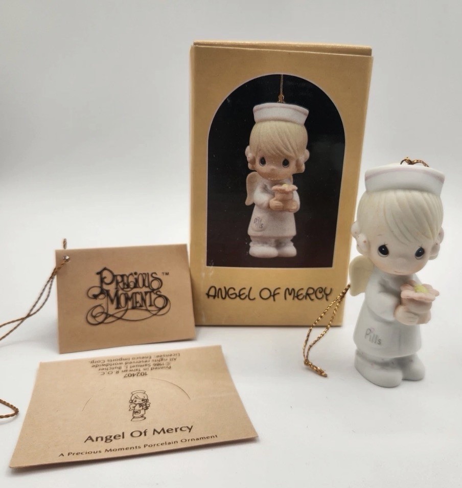 Vintage 1986 Precious Moments Angel of Mercy Christmas Ornament Nurse RN Flower