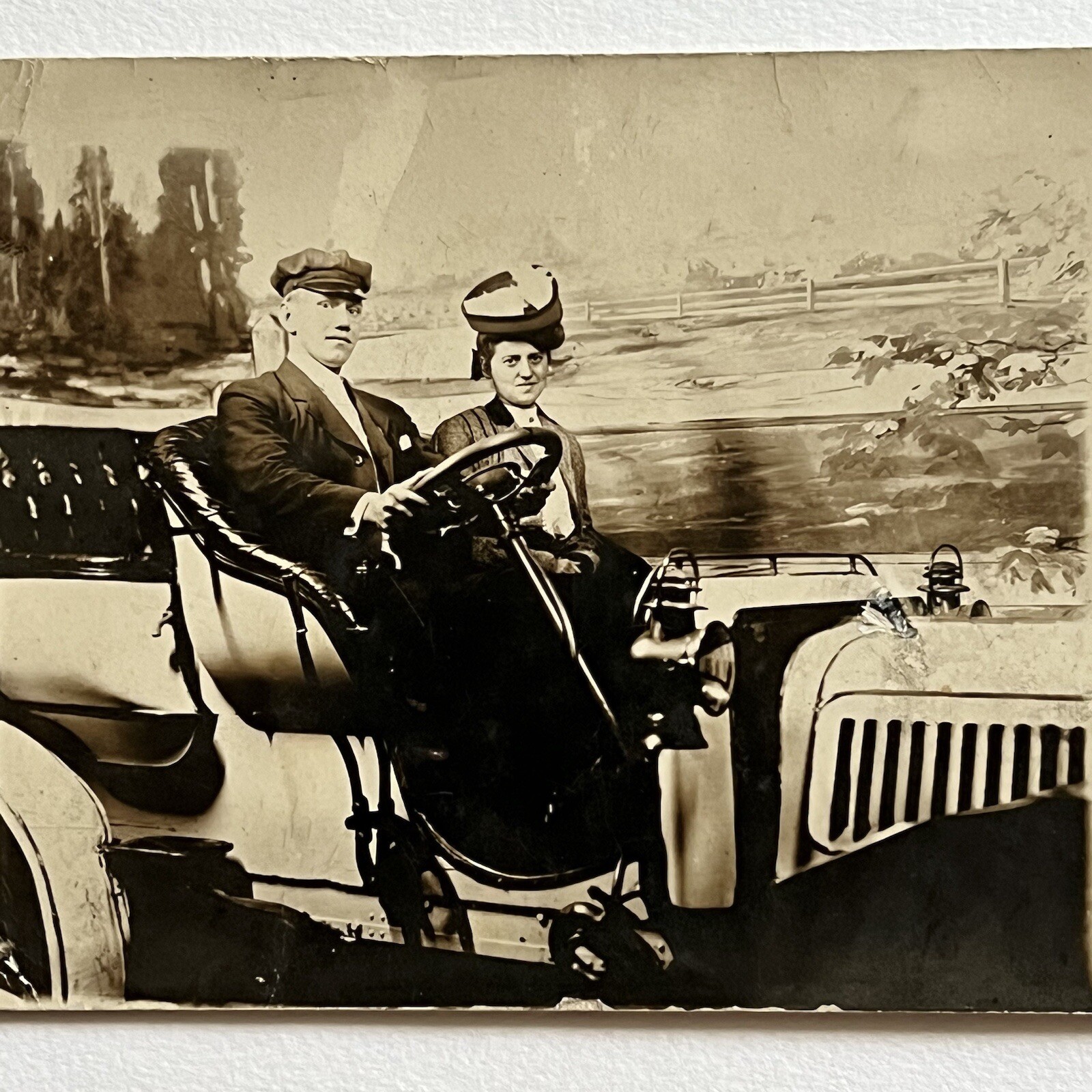 Antique RPPC Real Photograph Postcard Handsome Man & Woman In Prop Studio Car