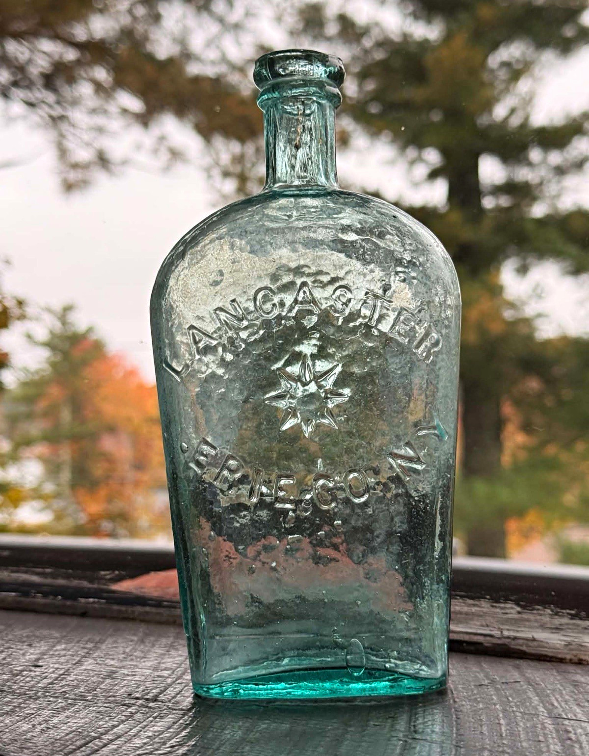 Antique Aqua Embossed Historical flask  