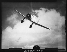 Photo:1930s 1940s Fighter Plane Aircraft in Flight Cloudy Sky Test Photo picture