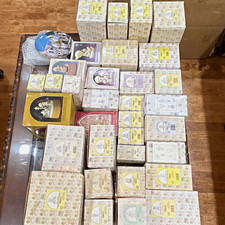 Enesco Precious Moments Figurines Boxed over 34 piece-3 musical works- 1 plate. picture