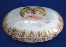 HAND-PAINTED PORCELAIN OVAL MATCH BOX / STRIKER 2 CHILDREN PINK & GOLD picture