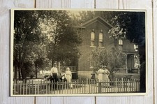 Antique RPPC Family Posing In Front Stately Brick House picture