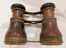 Antique opera glasses in brass with leather picture