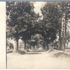 c1900s Dirt Road Residential Street View RPPC Postcard Ghostly Figure Trees picture