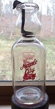 Rare Maple City Dairy bottle with ladle 1 qt. In perfect condition picture