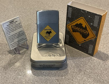 Genuine Brand New 1998 ZIPPO Lighter ROAD SIGN DINGOES NEXT 23km Brushed Chrome picture