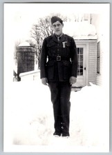 Vtg B&W Snapshot WWII Soldier in Uniform Standing in Snow By Barn Silo 1940s picture