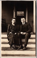 c1920s Real Photo RPPC Postcard Older Couple on House Porch Steps 