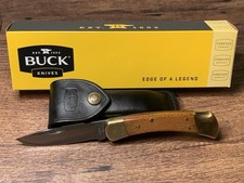 2015 01100KSSH-B Buck 110 Oak/Brass with 5160 Custom Drop Point Blade, NIB picture